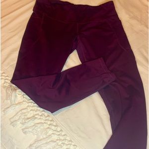 Maroon Champion leggings with pockets. 27 in.